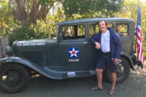 Jay Burbank takes a quick pause during his whirlwind packing and preparations for a 7,000-mile round trip he and a friend are taking to the Arctic Circle and back. He’ll drive about 1,400 miles of the trek in his 1931 Model A town sedan, honoring veterans and raising money for alternative-education graduates.(Kathe Tanne/Sacramento Bee photo)