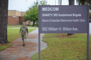 A U. S. Army soldier from 3rd Infantry Division exits Marne Embedded Behavioral Health Clinic on Fort Stewart, Georgia, Oct. 7, 2021, where service members can receive care to improve their mental health and wellness.