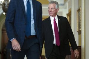 Sen. Tommy Tuberville walks through Capitol Hill