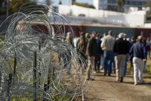 Concertina wire lines a path near the Texas-Mexico border