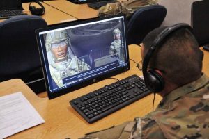 Soldier uses a computer to access professional development tools
