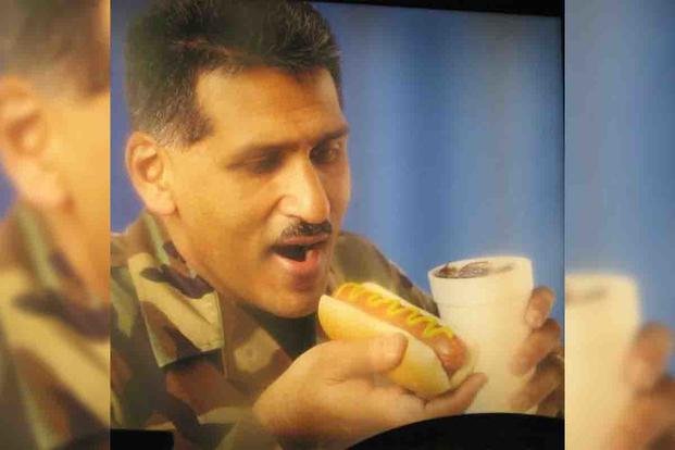 The Beloved Air Force Chief Behind the 'AAFES Hot Dog Guy' Meme Has Died