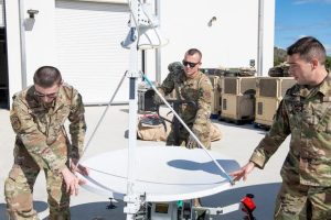 Members of the 114th Electromagnetic Warfare Squadron, Florida Air National Guard, operate a satellite at Cape Canaveral Space Force Station, Florida,.
