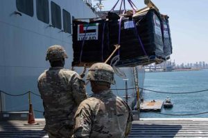 Soldier load humanitarian aid bound for Gaza
