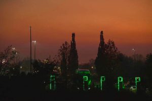 A hazy smog from fires at the Aberdeen Proving Ground mutes the sunset seen from Route 24 near I-95, where a putrid smoky smell also fills the air.