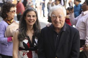 Arthur Frommer, 83, and his daughter, Pauline Frommer, 46, pose among tourists