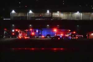 First responders are seen at Ronald Reagan Washington National Airport,