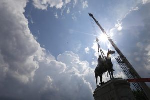 A crew removes the statue of Confederate Gen. Stonewall Jackson