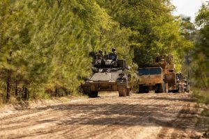 Soldiers conduct security operations from a Bradley Fighting Vehicle