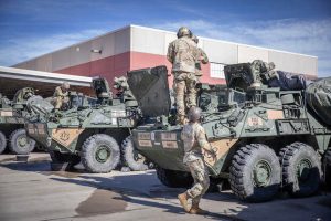 U.S. soldiers assigned to the 704th Brigade Support Battalion, 2nd Stryker Brigade Combat Team, 4th Infantry Division inspect a M1126 Stryker Combat Vehicle at Fort Carson, Colorado, Feb. 24, 2025, in support of the southern border mission.