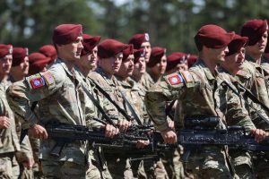 Paratroopers assigned to the 82nd Airborne Division march in formation