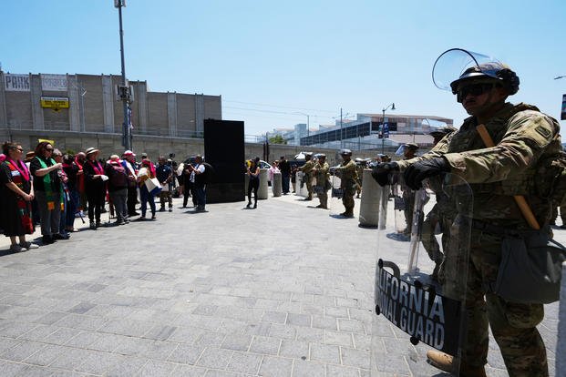 ApNewsroom_Immigration_Raids_Los_Angeles_29796.jpg National Guard stand by as protesters gather to denounce ICE in Los Angeles