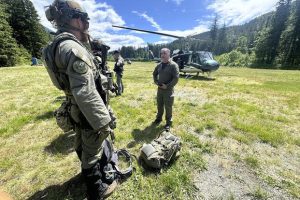 In this handout photo provided by the Snohomish County Sheriff's Office, deputies participate in the search for Travis Decker at an undisclosed location in Washington state, Friday, June 6, 2025.