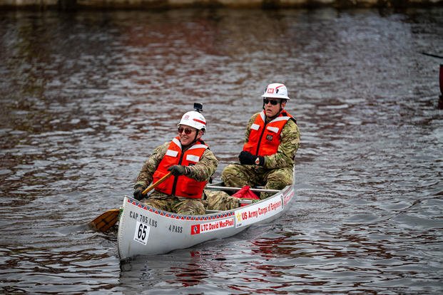 Members of the U.S. Army Corps of Engineers went for a paddle during the 60th River Rat Race on Millers River in Athol, Massachusetts
