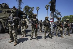 Federal agents stage at MacArthur Park in Los Angeles.