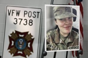 A photo display of National Guard member Specialist Sarah Beckstrom
